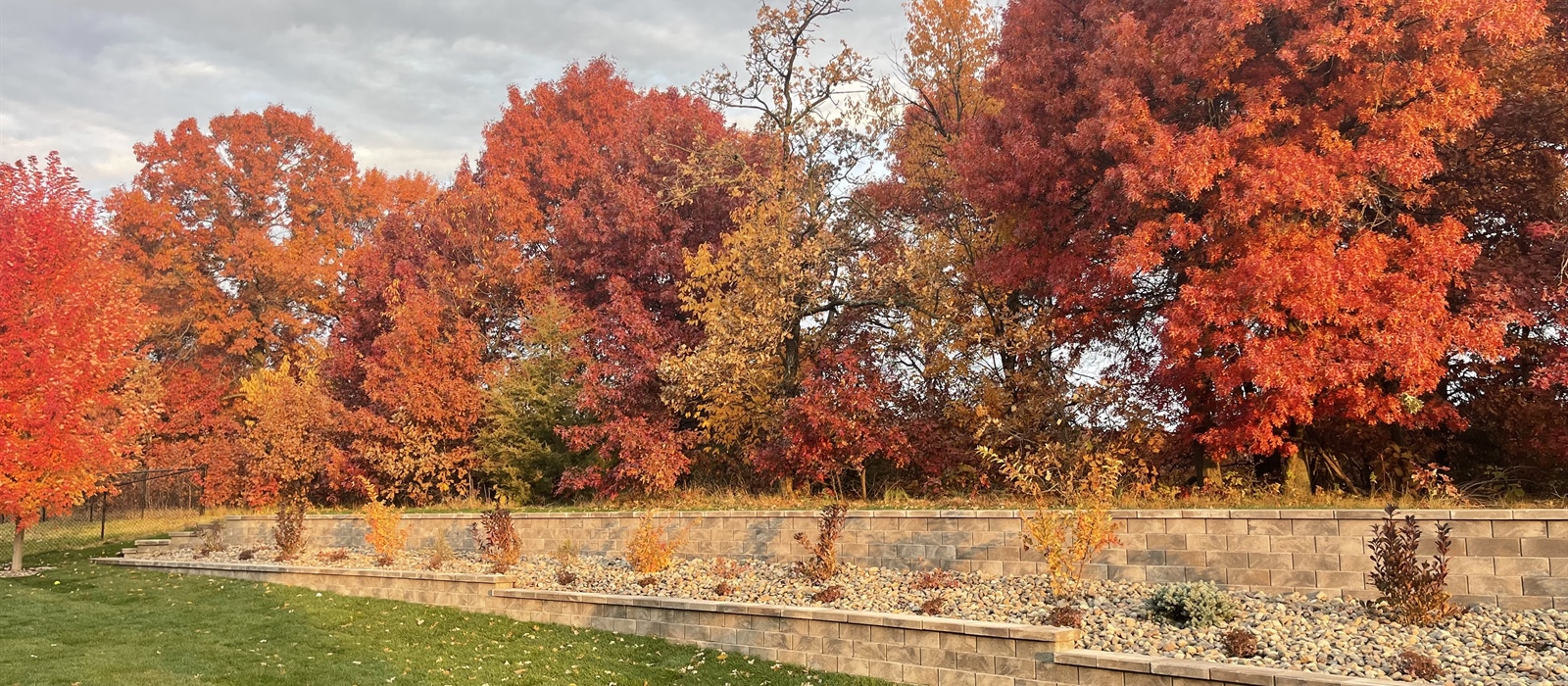 Retaining Walls for Erosion Control: Design, Materials, & Maintenance