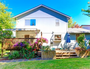 Designing Multi-Level Decks for Sloped Backyards: Structural & Safety Tips