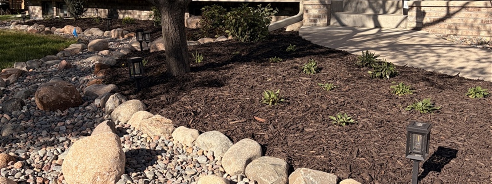 Anoka, MN Creek Bed Drainage & Landscape Installation Project