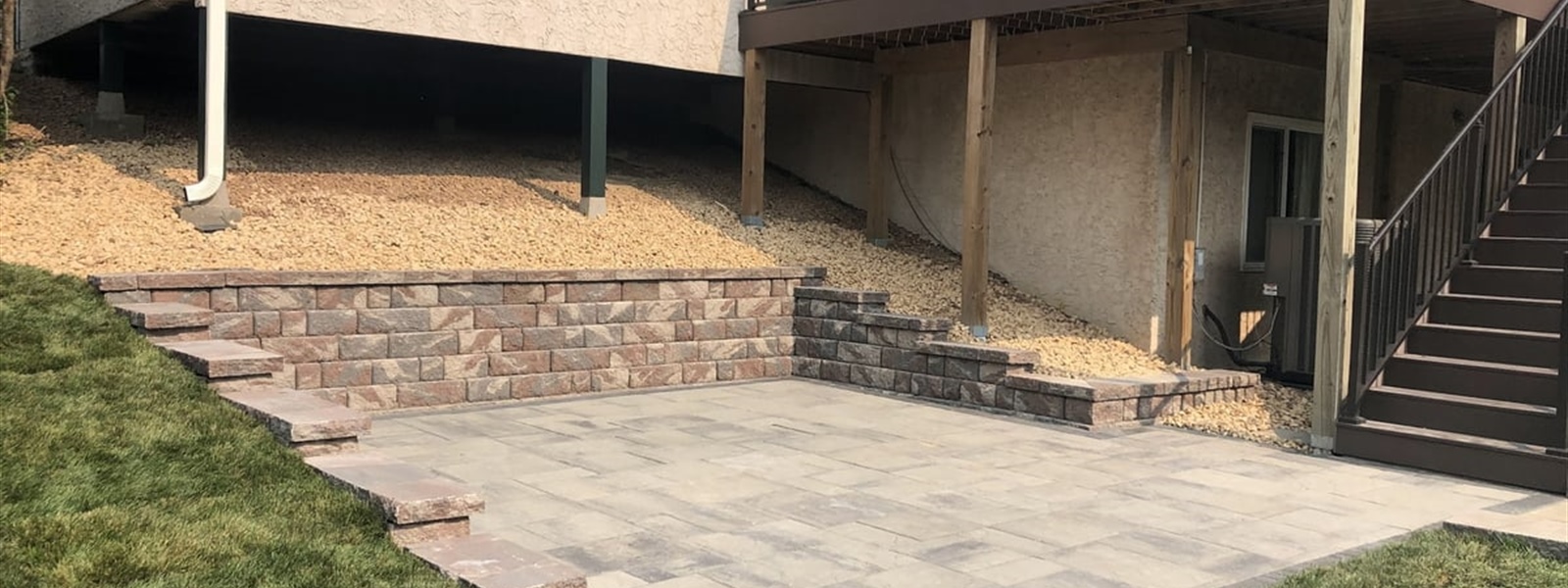 Slope Retaining Wall & Paver Patio Installation Project in Maple Grove, MN
