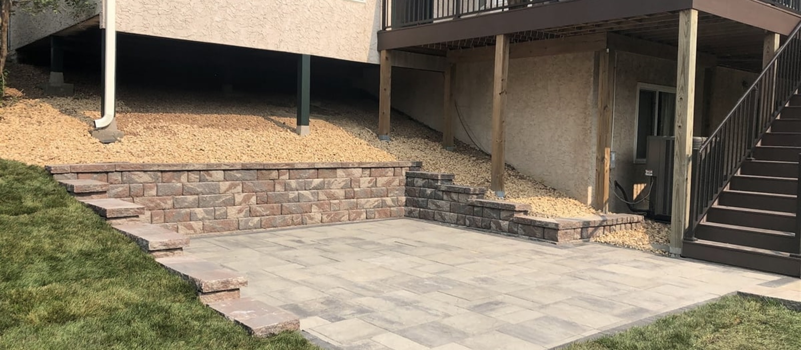 Slope Retaining Wall & Paver Patio Installation Project in Maple Grove, MN