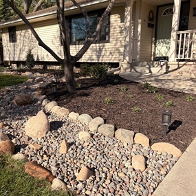 Dry creek bed landscape drainage installation in Anoka, MN